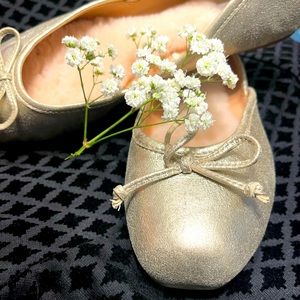 Gold Ugg ballerina flats, soft lined. Never used.